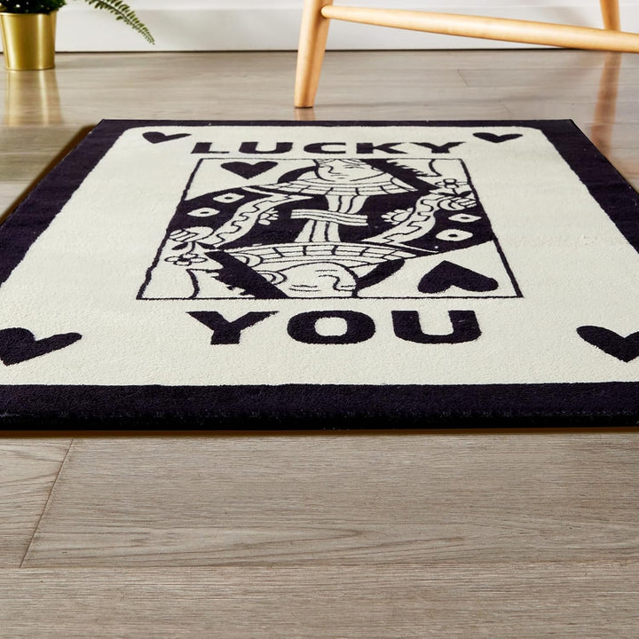 Aesthetic black and white "Lucky You" accent rug with a playful card design, shown in a front view close-up. This soft, fluffy rug highlights its plush texture and bold details, featuring a non-slip bottom for safety and easy maintenance. Perfect for dorms, bedrooms, and cozy spaces.
