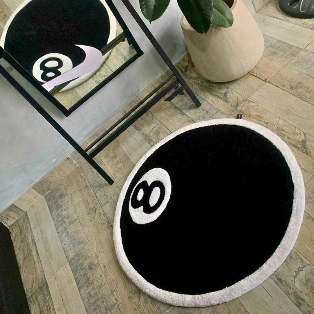Close-up of VibeCore Magic 8 Ball Accent Rug, highlighting its soft, plush texture and iconic black and white 8 ball design. A stylish, playful addition to any space, perfect for adding personality to a bedroom or living room.