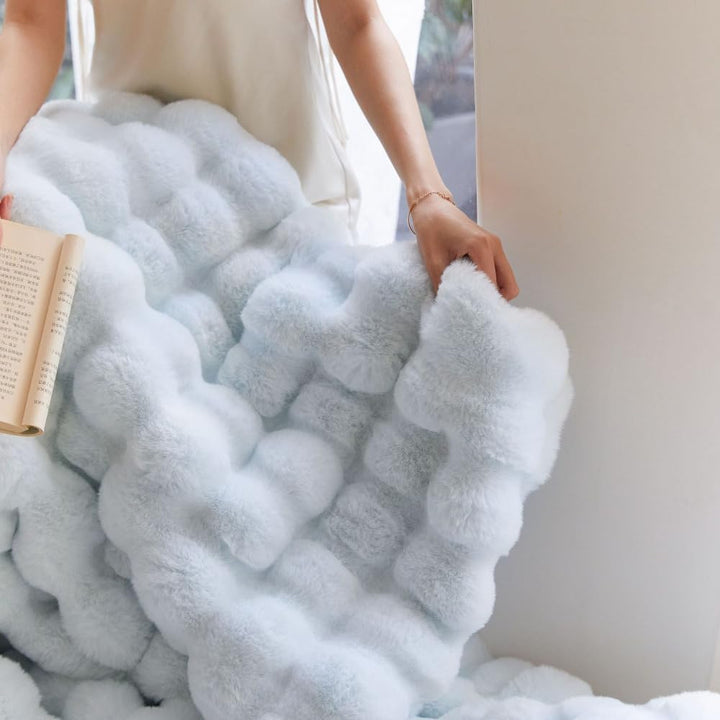 VibeCore Marshmallow Ultra Plush Blanket Pastel Blue Close Up Of Material and Thickness, showing how thick and soft the blanket is.