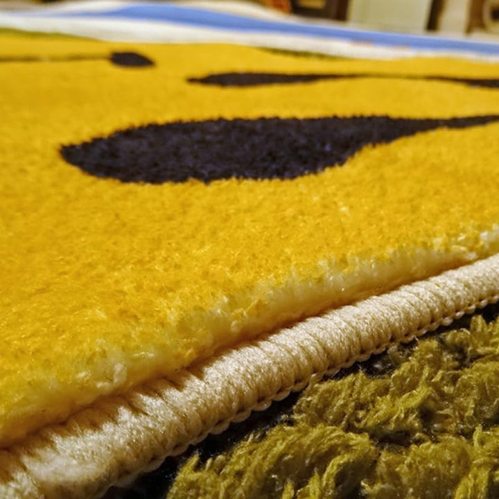 VibeCore Melted Smiley Accent Rug close-up showing the dripping smiley face design and soft, plush texture.