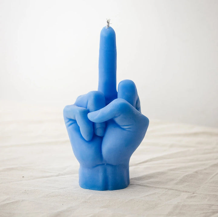 Blue eco-friendly soy wax candle shaped like a middle finger with a sleek cylindrical base.