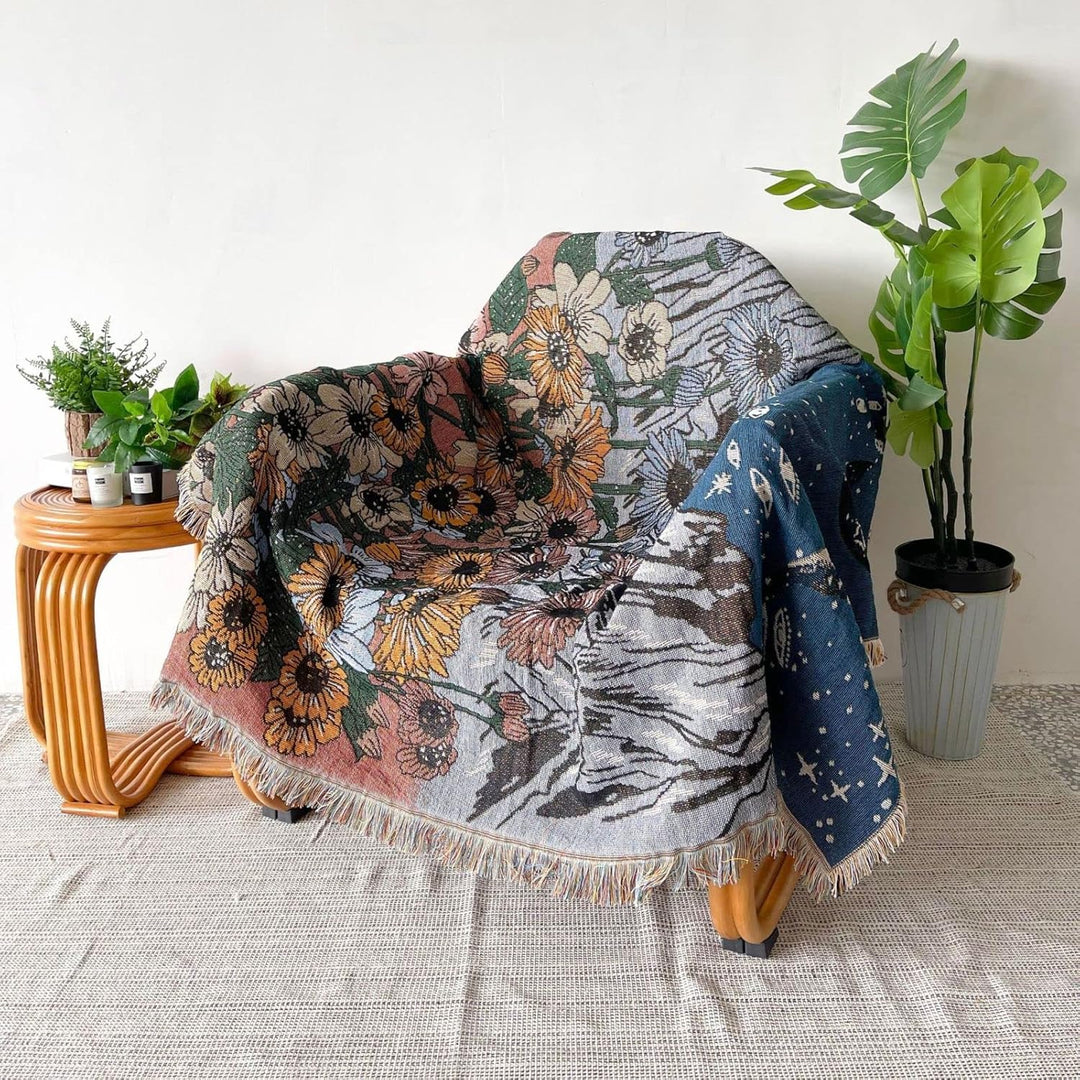 VibeCore Midnight Mountain Woven Blanket as a chair cover, showcasing a mountain-inspired design and soft 100% combed cotton texture.