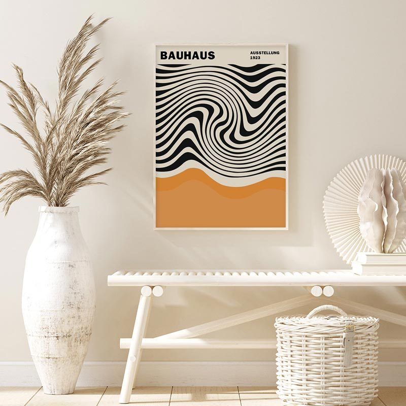 VibeCore Modern Art Classics Canvas Poster featuring Bauhaus design, displayed on the wall. This iconic piece embodies the geometric, minimalist principles of the Bauhaus movement, bringing a modern, architectural touch to your space. Perfect for adding a sleek, contemporary vibe to your bedroom, dorm, or apartment. Printed on premium cotton canvas with fade-resistant colors for lasting vibrancy.