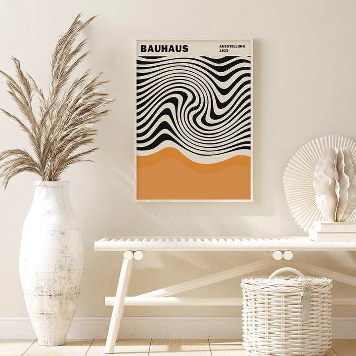 VibeCore Modern Art Classics Canvas Poster featuring Bauhaus design, displayed on the wall. This iconic piece embodies the geometric, minimalist principles of the Bauhaus movement, bringing a modern, architectural touch to your space. Perfect for adding a sleek, contemporary vibe to your bedroom, dorm, or apartment. Printed on premium cotton canvas with fade-resistant colors for lasting vibrancy.