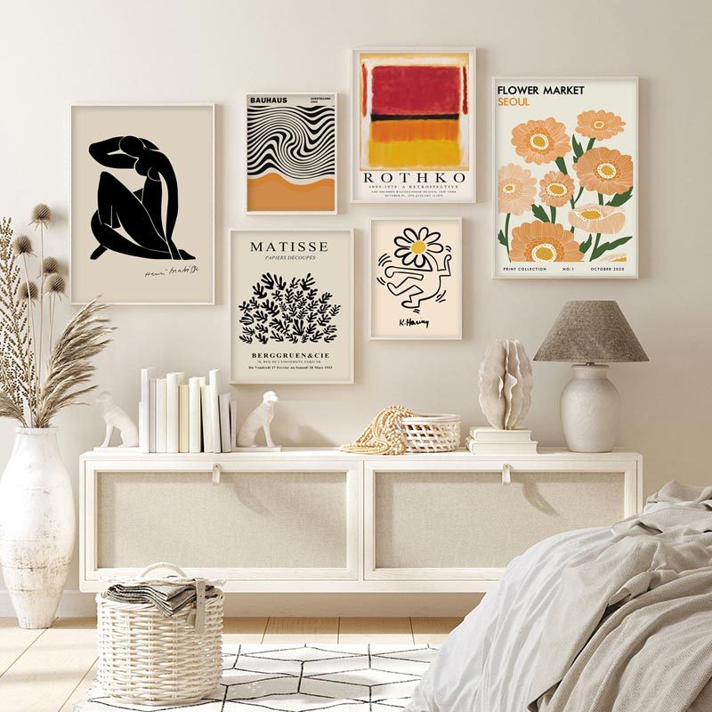 
"Modern Art Classics Canvas Posters" wall collage showcasing iconic designs from Matisse, Keith Haring, and Rothko. Featuring bold shapes and vibrant colors, this collection creates a dynamic, contemporary vibe in any room. Perfect for curating a chic, minimalist gallery wall with lasting, fade-resistant prints on premium cotton canvas.