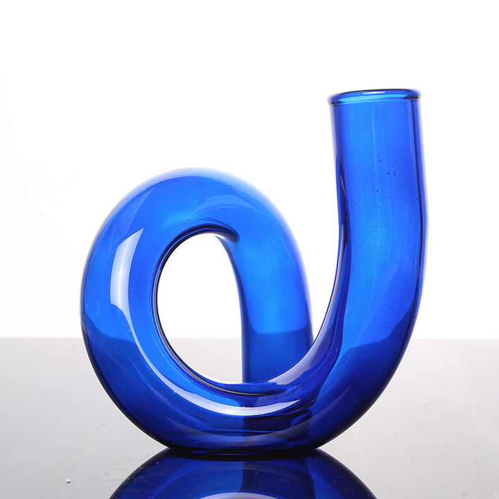 VibeCore Modern Twist Glass Candle Holder in blue, crafted from borosilicate glass with a glossy finish, perfect as a vase or candle holder in modern decor.