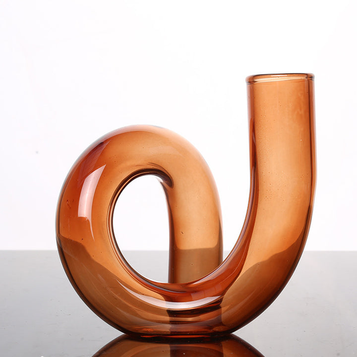 VibeCore Modern Twist Glass Candle Holder in brown, featuring a polished finish, ideal for small candles or floral arrangements, offering a minimalist and contemporary aesthetic.