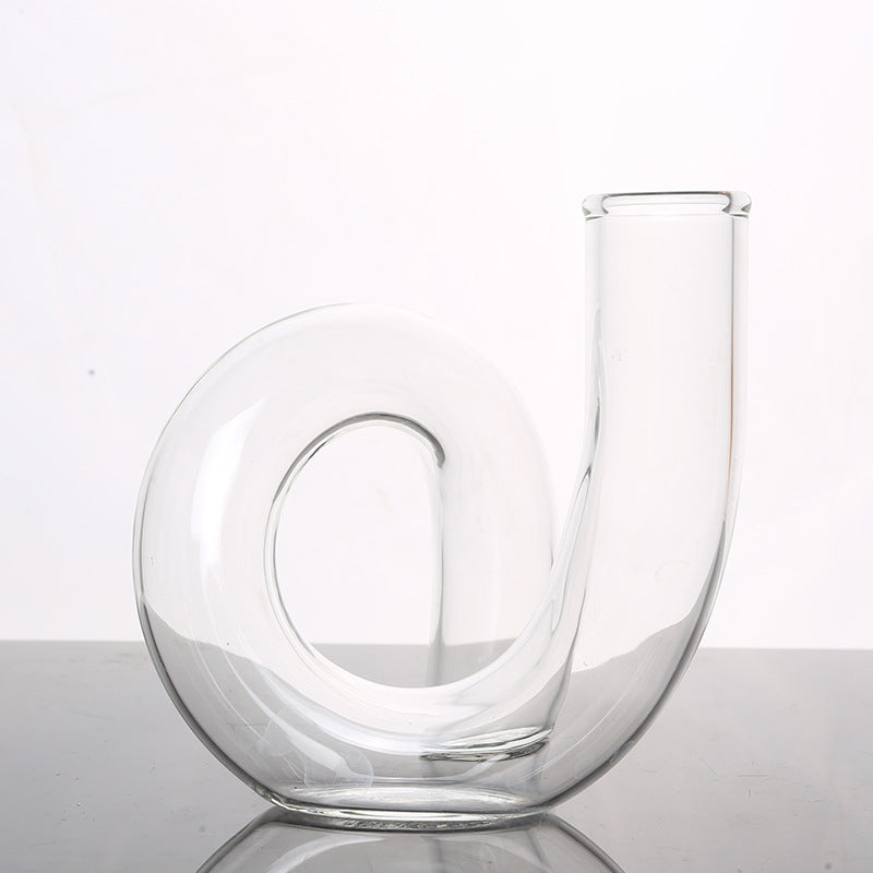 VibeCore Modern Twist Glass Candle Holder in clear transparent borosilicate glass, sleek dual-use vase and candle holder for modern minimalist home decor.