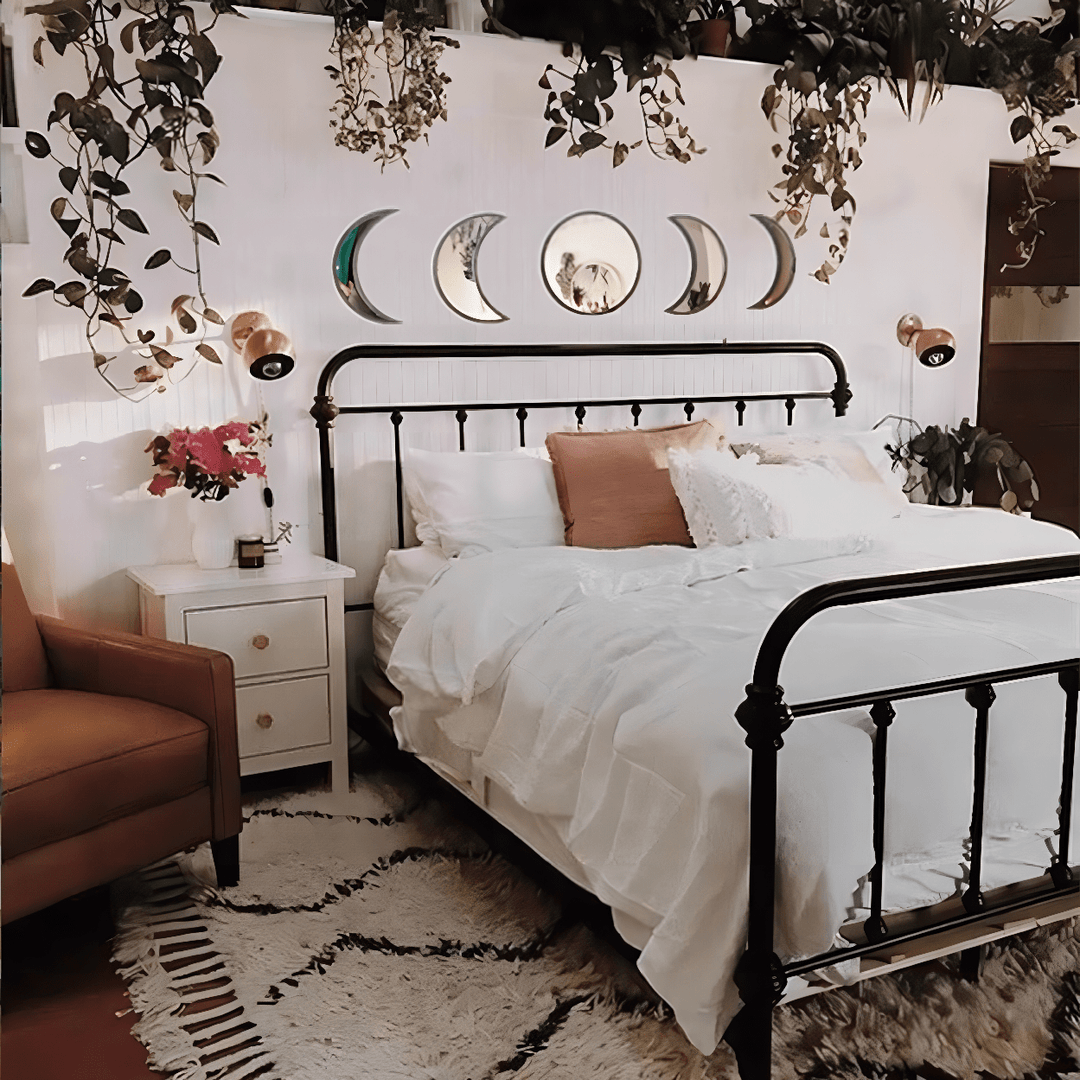 VibeCore Moon Phases Mirror Set in black, displayed in a boho room. Featuring a sleek black design, this set showcases the phases of the moon, adding a mystical and bohemian touch to the decor. Perfect for creating a unique, cosmic vibe, the mirrors blend effortlessly with boho aesthetics, enhancing the room’s ambiance.