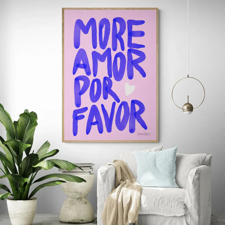 ‘More Amor Por Favor’ pink canvas poster displayed in the living room, adding a vibrant, playful love message to the space with bold colors and modern design.