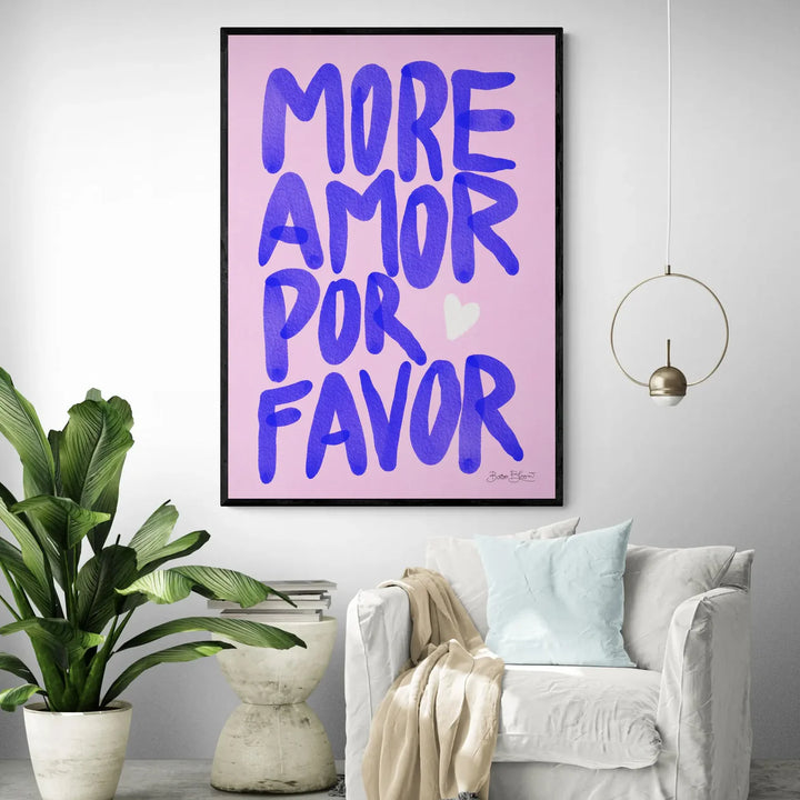 More Amor Por Favor’ pink canvas poster displayed on a wall, featuring a vibrant, playful love message in a bold, modern eclectic design.
