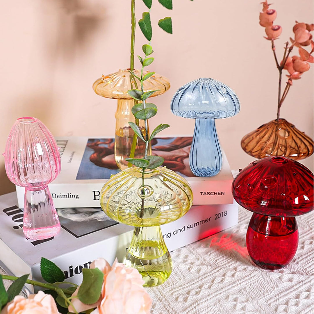 Mushroom Glass Vases with flowers arranged inside, showcasing colorful blooms in unique, organic glass vases with four openings.