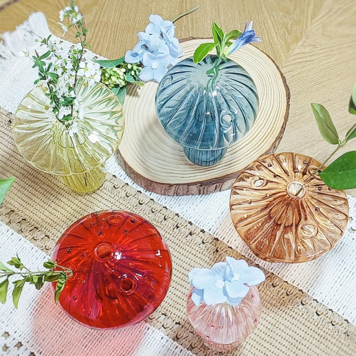 Aerial view of Mushroom Glass Vases with flowers arranged inside, highlighting the unique design and vibrant blooms in organic glass vases.