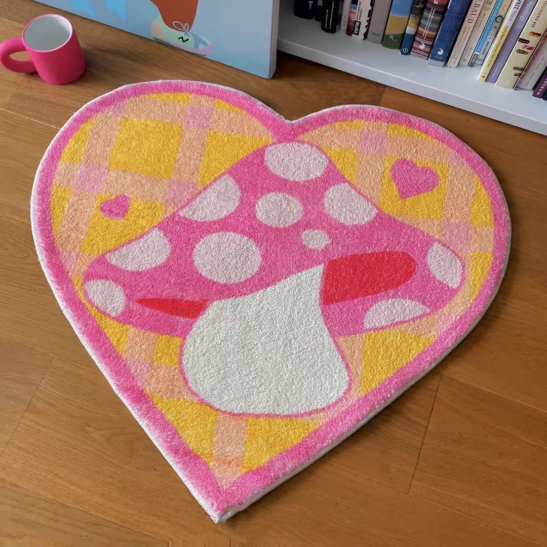 VibeCore Mushroom Heart Accent Rug shown from an aerial view, highlighting its playful mushroom and heart design, soft texture, and non-slip backing, perfect for adding warmth and charm to any space.