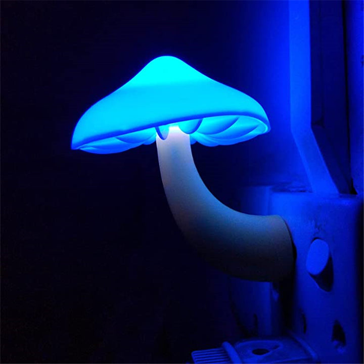 VibeCore Mushroom Night Light in blue, casting a soft, calming glow. Ideal for creating a serene atmosphere, this energy-efficient night light automatically turns on in the dark for convenience.