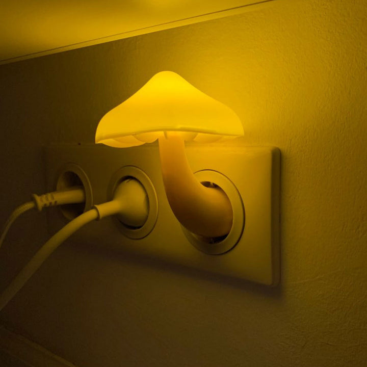 VibeCore Mushroom Night Light in yellow, emitting a warm, soothing glow. This automatic, energy-efficient light adds a cozy, nature-inspired vibe to any space.