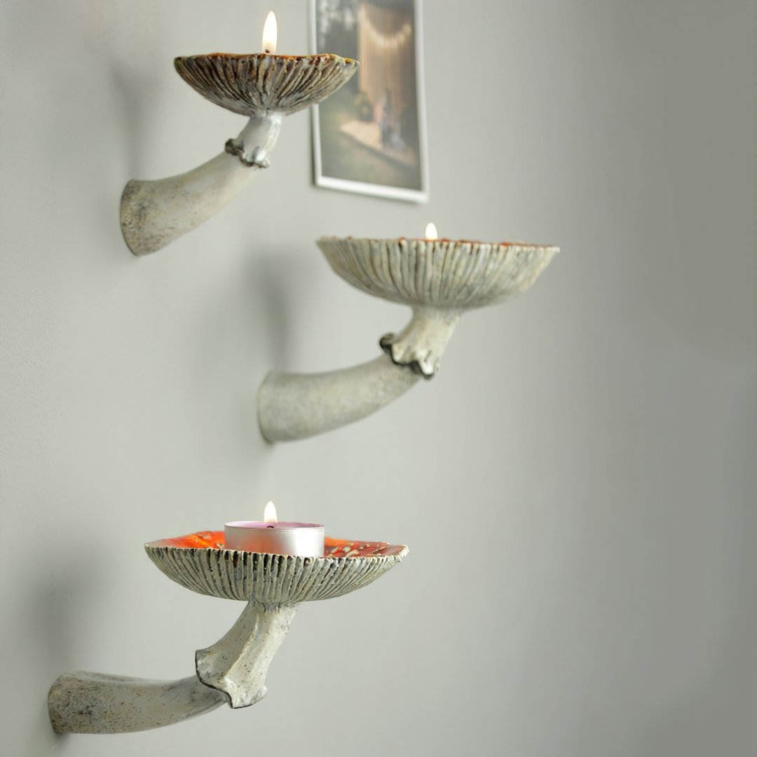 VibeCore Mushroom Wall Shelf showcasing three medium-sized mushrooms, crafted from durable resin to add a nature-inspired, whimsical touch to any room's decor.