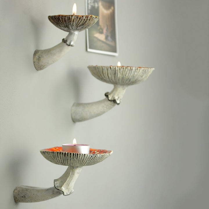 VibeCore Mushroom Wall Shelf showcasing three medium-sized mushrooms, crafted from durable resin to add a nature-inspired, whimsical touch to any room's decor.