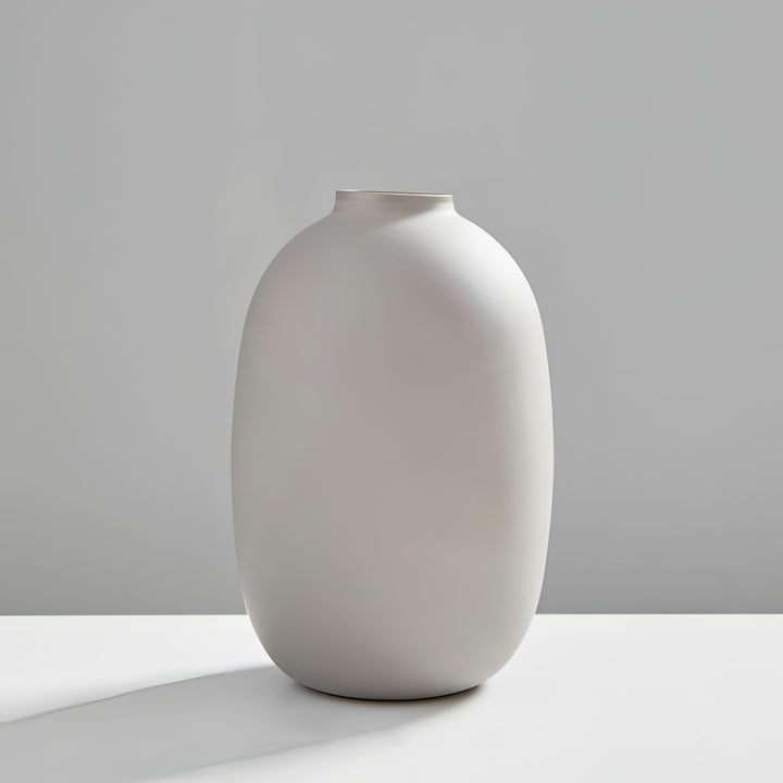 VibeCore Nordic Ceramic Vase in gray, showcasing a sleek matte finish and modern Nordic design, ideal for minimalist home or office decor.
