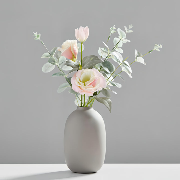 VibeCore Nordic Ceramic Vase in gray filled with fresh flowers, featuring a matte finish and minimalist Nordic design for modern room decor styling.