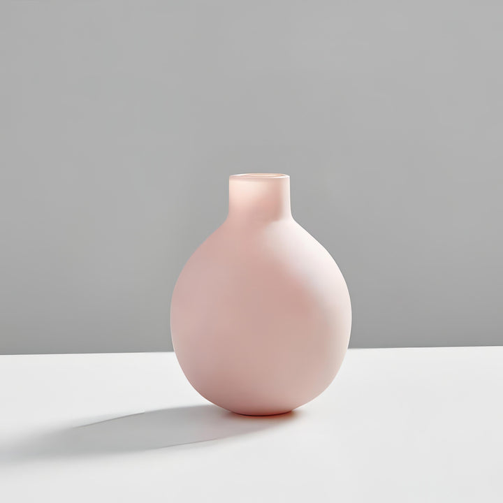 VibeCore Nordic Ceramic Vase Pink Mini, featuring a minimalist design with sleek lines and a matte finish, crafted from a high-quality ceramic-porcelain blend, perfect for adding a modern accent to any room or showcasing your favorite flowers.
