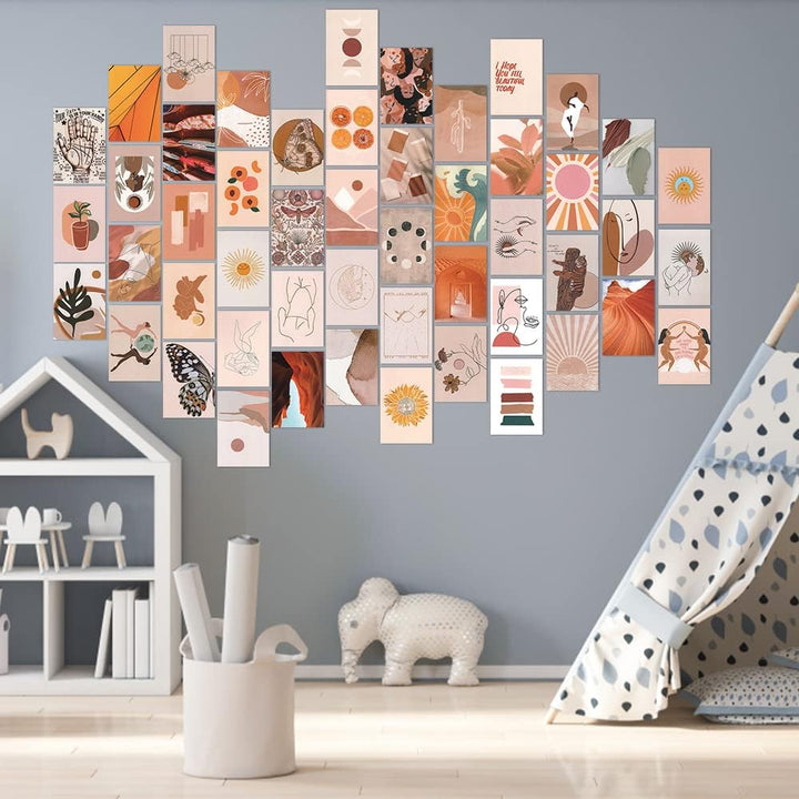 VibeCore Peace Goddess Wall Collage Kit displayed on a room wall, featuring 70 calming prints in warm peach and orange tones with goddess-inspired and nature-themed designs. Adds a serene, feminine, and artistic vibe to the space.