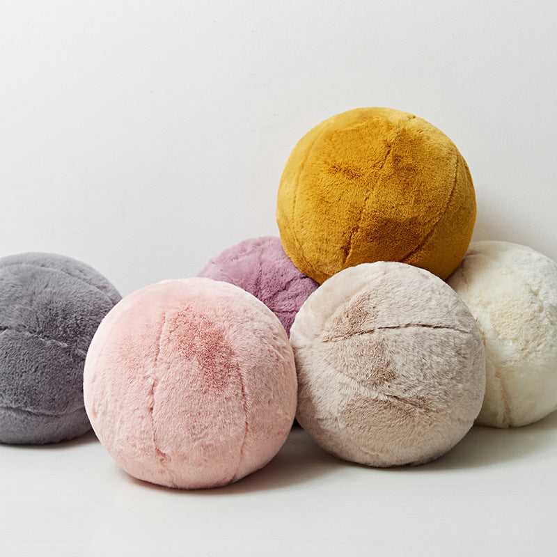 VibeCore Plush Ball Throw Pillow in a cozy color cluster, featuring beige, white, gray, lilac, baby pink, and mustard yellow. Ultra-soft, fluffy round pillow for modern, cozy, and hygge-inspired room decor. Perfect for beds, couches, and dorm rooms.