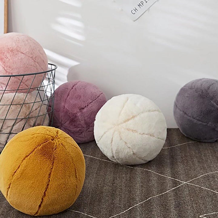 VibeCore Plush Ball Throw Pillow in a living room setting, showcasing its ultra-soft, fluffy design for a modern, cozy, and hygge-inspired decor. Perfectly placed on couches for added comfort and style.