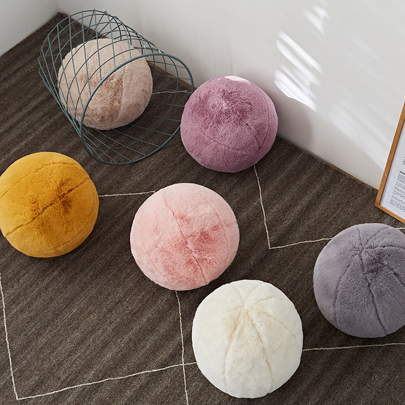 VibeCore Plush Ball Throw Pillow on the floor, featuring its ultra-soft, fluffy design for a modern, cozy, and hygge-inspired vibe. A stylish and comfortable addition to any room decor.