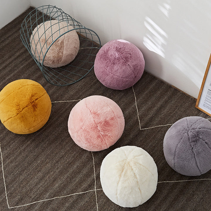 VibeCore Plush Ball Throw Pillow on the floor, featuring its ultra-soft, fluffy design for a modern, cozy, and hygge-inspired vibe. A stylish and comfortable addition to any room decor.