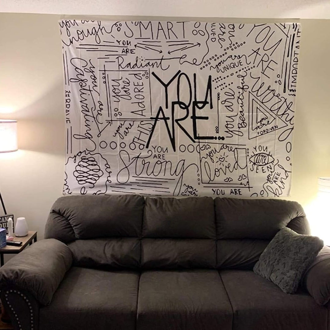 VibeCore Positive You Are Tapestry On Wall Behind Couch