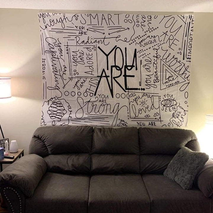VibeCore Positive You Are Tapestry On Wall Behind Couch