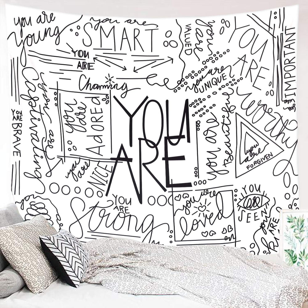 VibeCore Positive You Are Tapestry On Wall Beside Bed