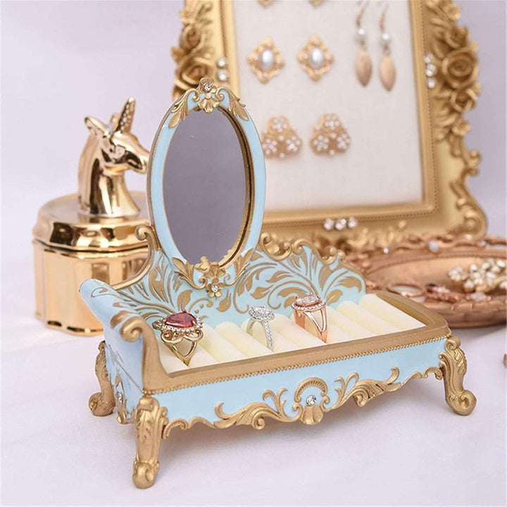 VibeCore Princess Ring Holder resin jewelry rack with glass mirror, holding rings and small accessories.