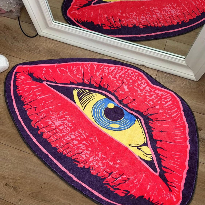 VibeCore Psychic Lips Accent Rug in front of a mirror, featuring a bold, artistic design with vivid lips and a mystical gaze, creating a stylish, surreal vibe in the room.