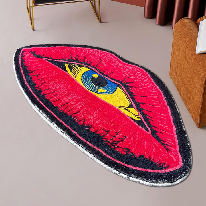 VibeCore Psychic Lips Accent Rug on the floor, showcasing a bold, artistic design with striking lips and a mystical gaze, adding an edgy touch to the space.