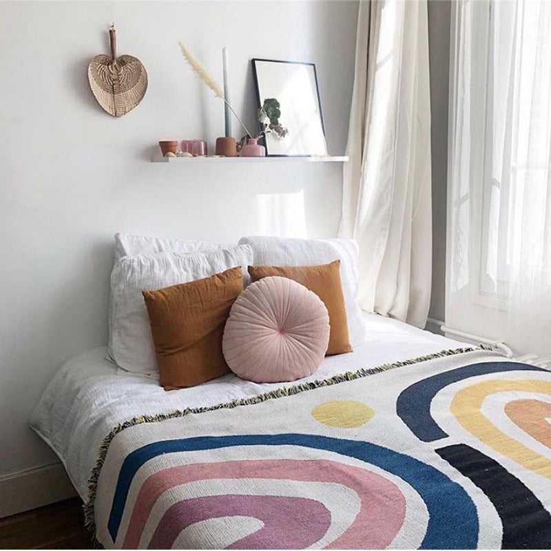VibeCore Rainbow Dreams Woven Cotton Blanket on Bed - Colorful Reversible Bohemian Bedspread for Vibrant Bedroom Decor