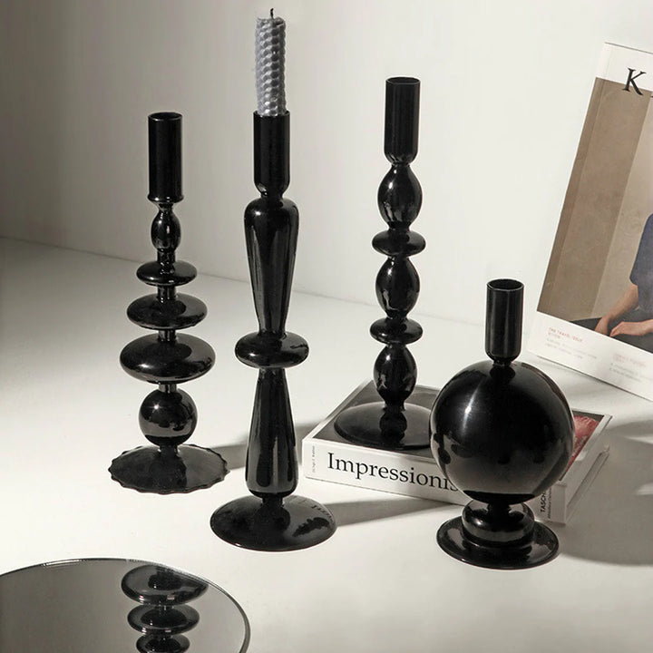 VibeCore Retro Abstract Glass Candle Holder in black shown in all three sizes, featuring sleek geometric shapes and glossy hand-blown glass craftsmanship.