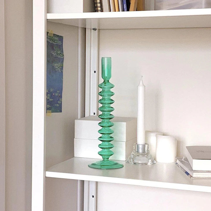 VibeCore Retro Abstract Glass Candle Holder green Option A styled on shelf with modern decor showing hand-blown glass and geometric retro design.