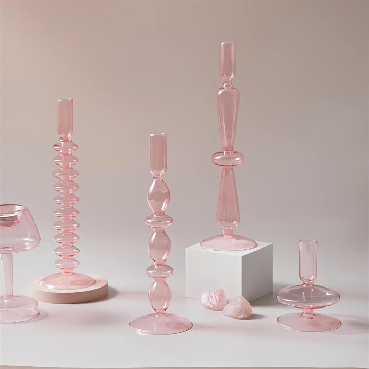 VibeCore Retro Abstract Glass Candle Holder in light pink displayed in all three sizes, showcasing hand-blown borosilicate glass and modern geometric design.