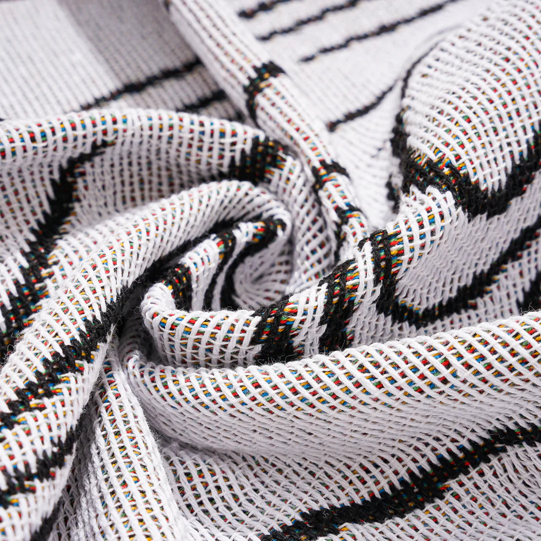 VibeCore Retro Marble Wave Woven Blanket material close-up, showcasing soft 100% combed cotton texture and vibrant, spiritual-inspired design.
