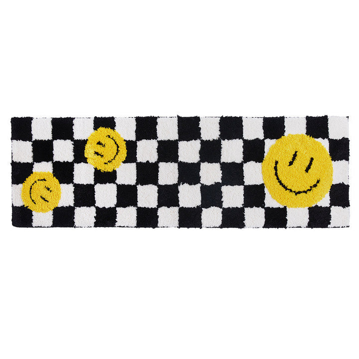 The VibeCore Retro Remix Accent Rug featuring a smiley design, displayed in a product view. This fun, bold rug combines retro vibes with playful charm, making it a perfect addition to any space with its soft texture and eye-catching pattern.