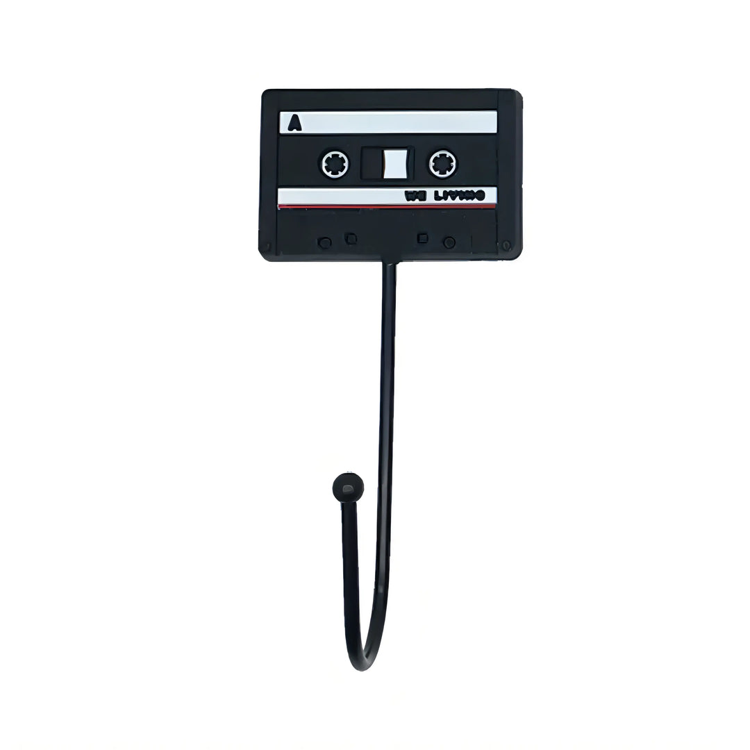 VibeCore Retro Wall Hook designed to resemble a vintage cassette tape, with a self-adhesive backing for easy installation, perfect for hanging items like jackets, bags, or towels.