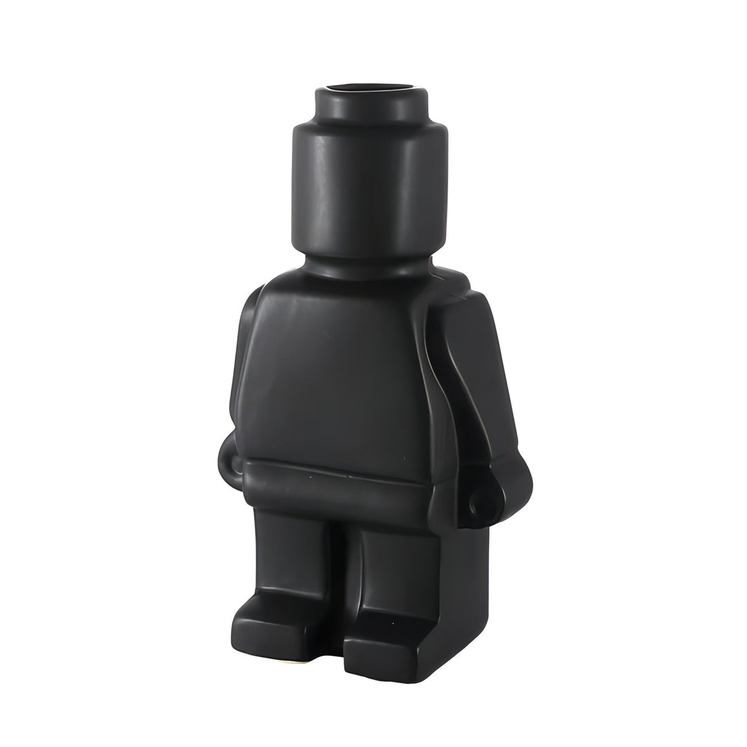 Aesthetic robot vase in black showcasing a sleek minimalist design with pop-culture influence perfect for adding a bold artistic touch to modern home decor.