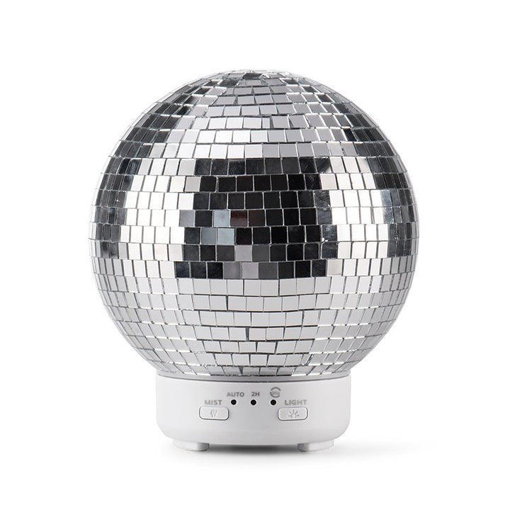 VibeCore Rotating Disco Ball Diffuser displayed in a stylish setting, highlighting its vibrant, rotating light patterns and sleek design.