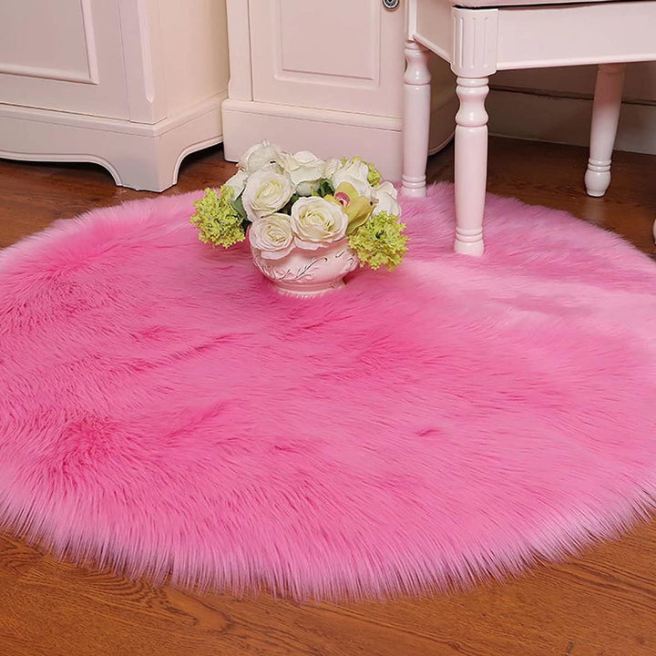 VibeCore Round Faux Fur Accent Rug in hot pink, close-up view showing soft, fluffy texture. Features a non-slip backing, perfect for dorm rooms, bedrooms, or living rooms. Easy to clean, available in multiple colors.