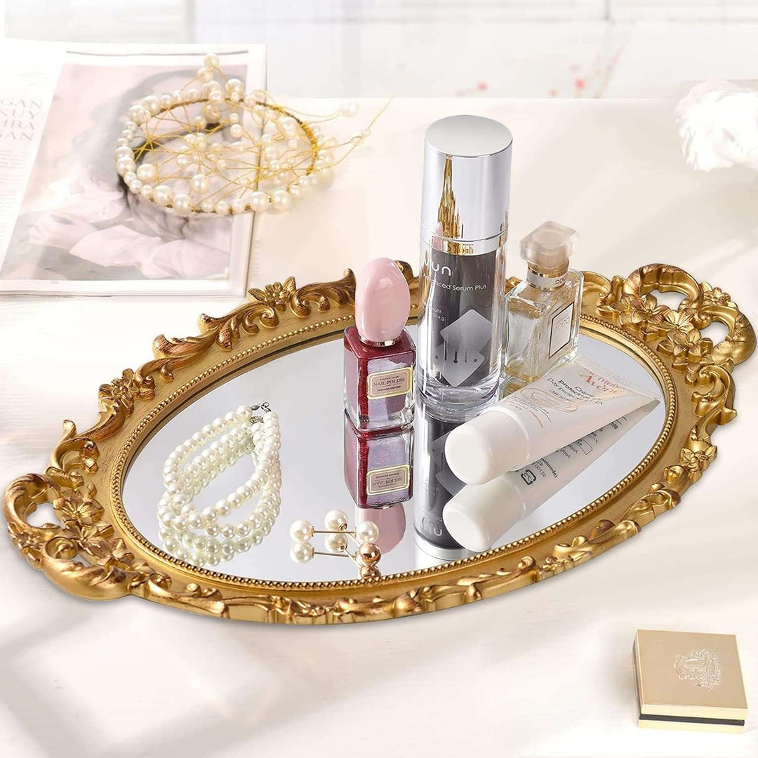 VibeCore Round Royal Mirror Gold Tray with accessories and cosmetics, showcasing an elegant resin-crafted design. Ideal for organizing and displaying your favorite items, adding a luxurious European charm to any surface.