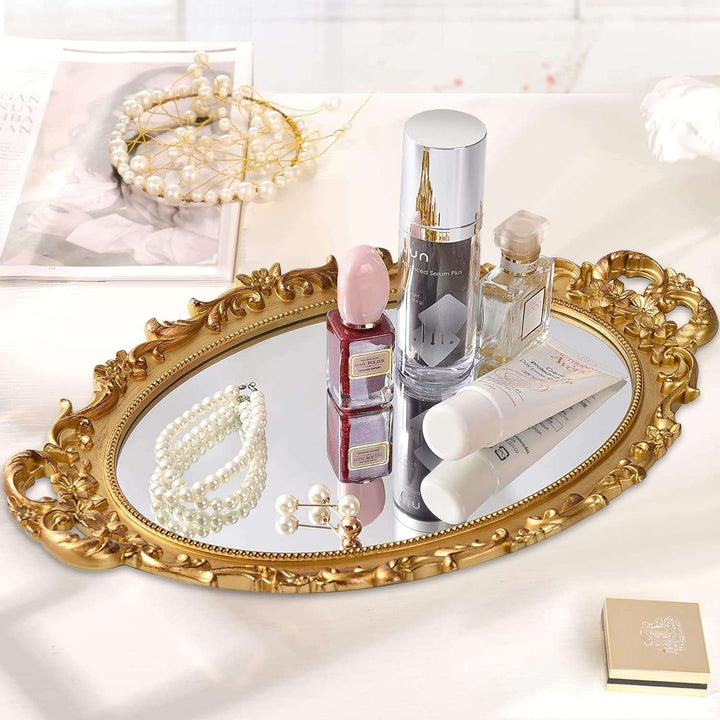 VibeCore Round Royal Mirror Gold Tray with accessories and cosmetics, showcasing an elegant resin-crafted design. Ideal for organizing and displaying your favorite items, adding a luxurious European charm to any surface.