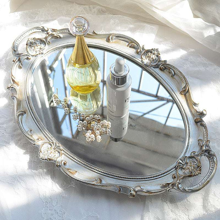 VibeCore Round Royal Mirror Tray in Silver, showcasing its elegant resin-crafted design. A stylish and functional piece, perfect for organizing perfumes, jewelry, or decor while adding a refined European touch to any surface.