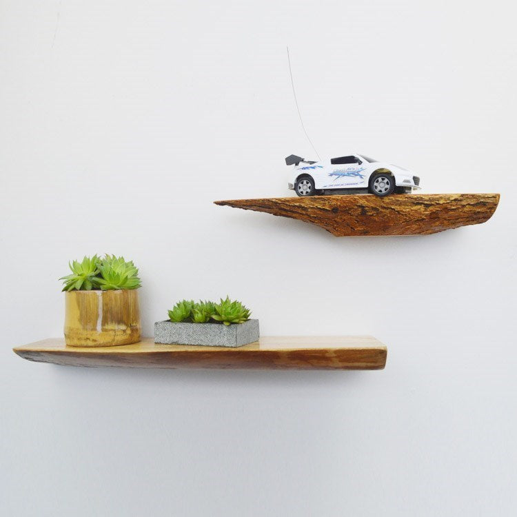 VibeCore Rustic Solid Wood Floating Wall Shelves mounted on a wall, displaying plants and decor with a natural wood finish.